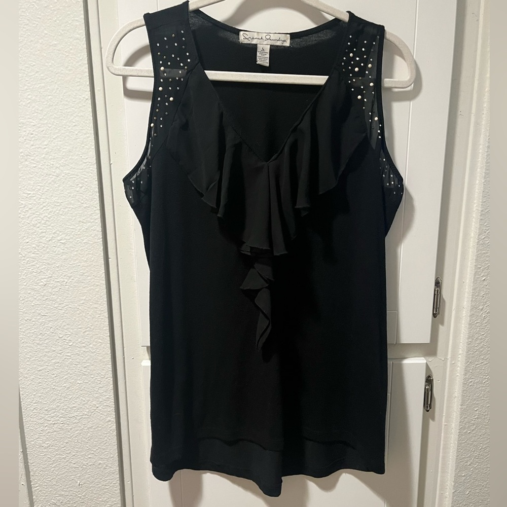 Flattering Ruffled V-Neck Tank Top trimmed in studs and rhinestones!